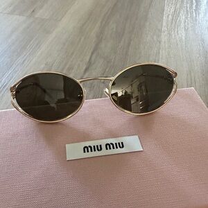 Miu Miu Gold-Tone Oval Logo Sunglasses with Loden Lenses